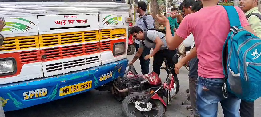 Young man came under the bus, life saved because of helmet